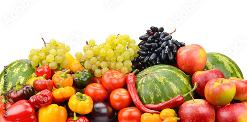 Ripe and fresh vegetables and fruits isolated on white
