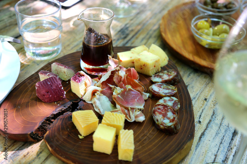 Albanian food in the famous restaurant Mrizi I Zanave in village Fishte, region of Zadrima. Domestic food appetizers and wine.