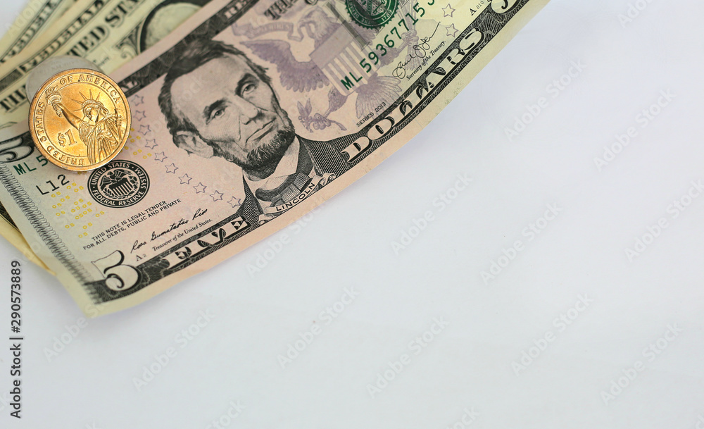 Hand holding dollar banknotes to pay for something. Hand holding dollar banknotes to pay for something.