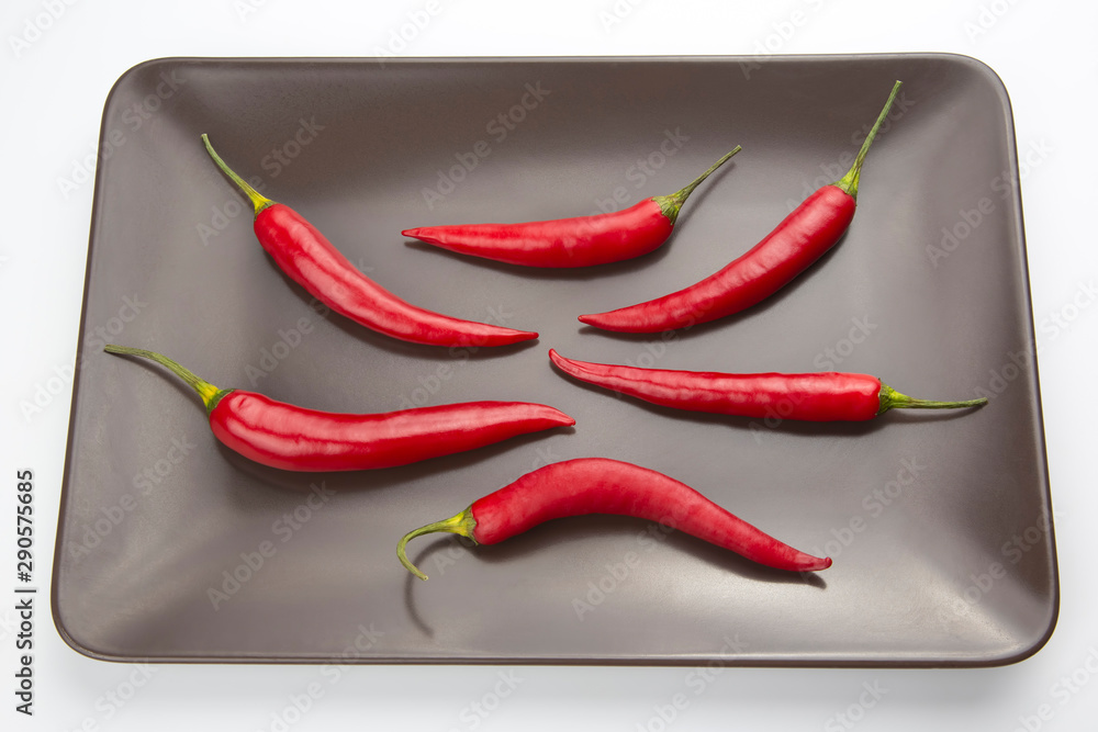 Hot red pepper on a gray plate
