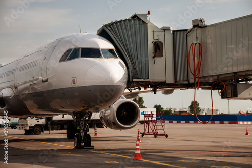 Teletrap connected to the aircraft. telescopic ladder is connected to taircraft. airport engineering systems . Boarding and disembarking passengers from an airplane. sleeve is connected to aircraft.
