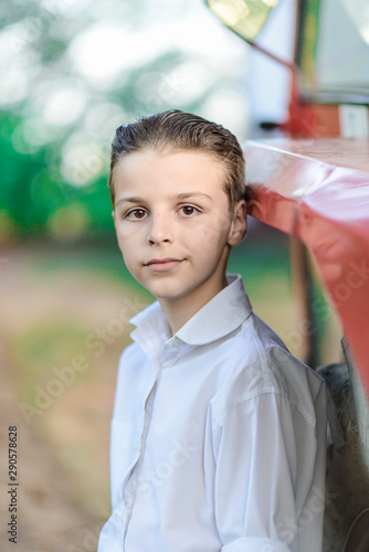 portrait of a adorable boy looking straight at the camera