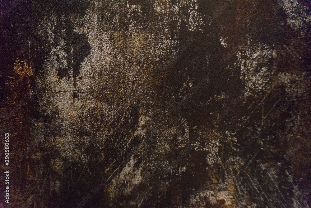 Naklejka premium Dark black and brown background texture of a wallpaper with rusty stain and metallic pattern.