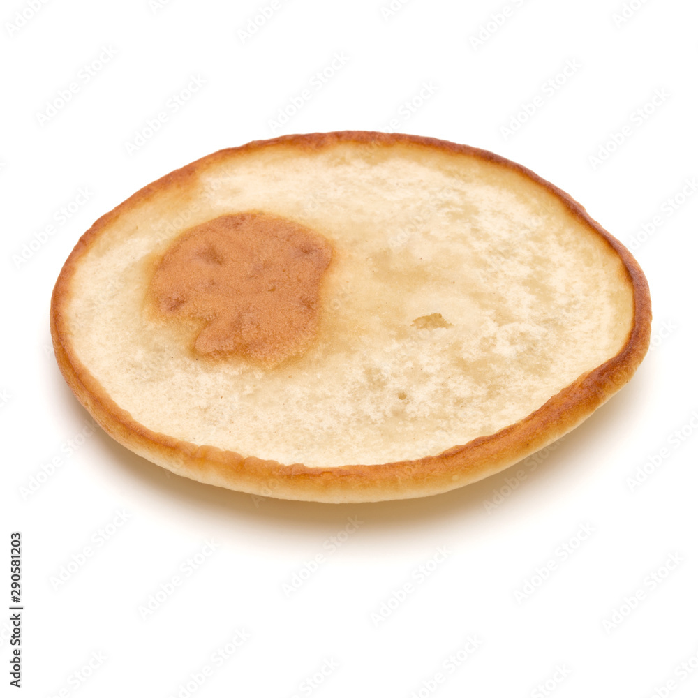 One pancake isolated on white background cutout. One pancake isolated on white background cutout.