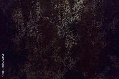 Dark black and brown background texture of a wallpaper with rusty stain and metallic pattern.