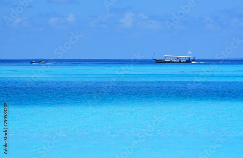 Two boats in the blue waters of Indian Ocean © chembarisovstudio