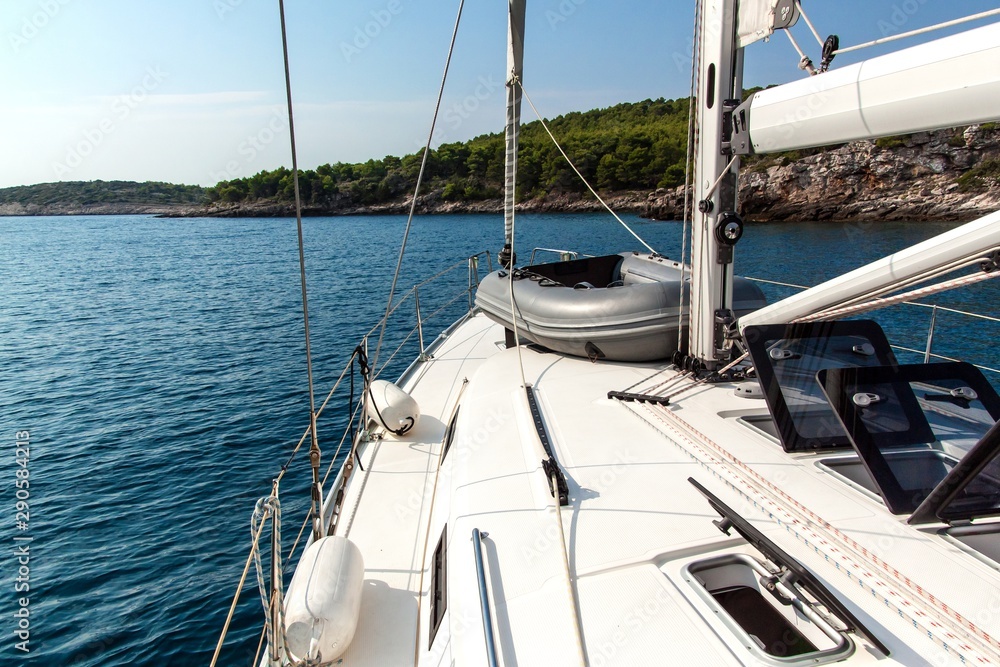 Fototapeta premium Sailing holidays in Croatia. Romance of yachting. Sailing on the sea near Croatian islands. Yacht deck. Adventure cruise.