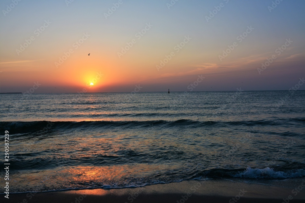 a beautiful sunrise at the seashore