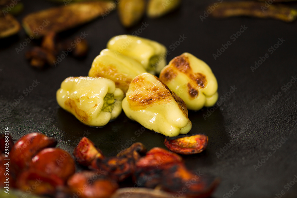 Grilled peppers and vegetables for sale outdoor Grilled peppers and vegetables for sale outdoor