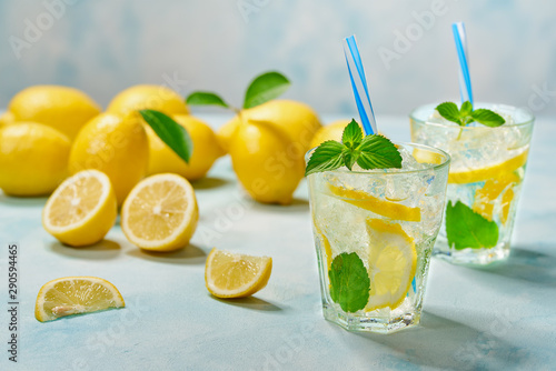 Homemade lemonade  on a light background, cold refreshing drink .