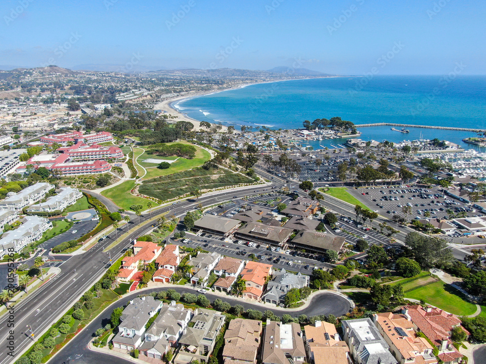 Aerial view of Dana Point Harbor town and beach - obrazy, fototapety, plakaty 