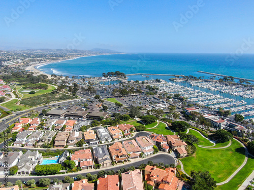 Aerial view of Dana Point Harbor town and beach