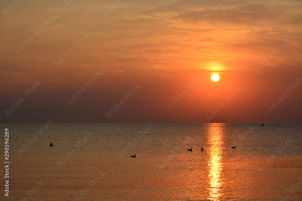 a beautiful sunrise at the seashore