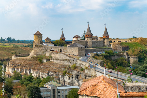 Medieval fortification. Old fortress with towers and fortified walls. Ukraine, Kamenets Podolsky photo