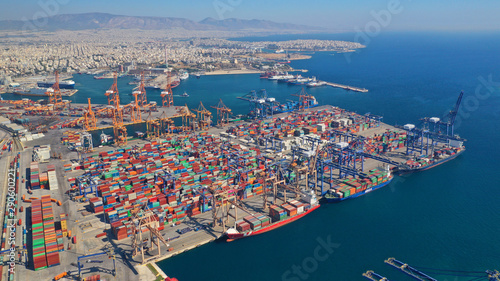 Aerial drone photo of industrial cargo container terminal in commercial port of Piraeus, Attica, Greece