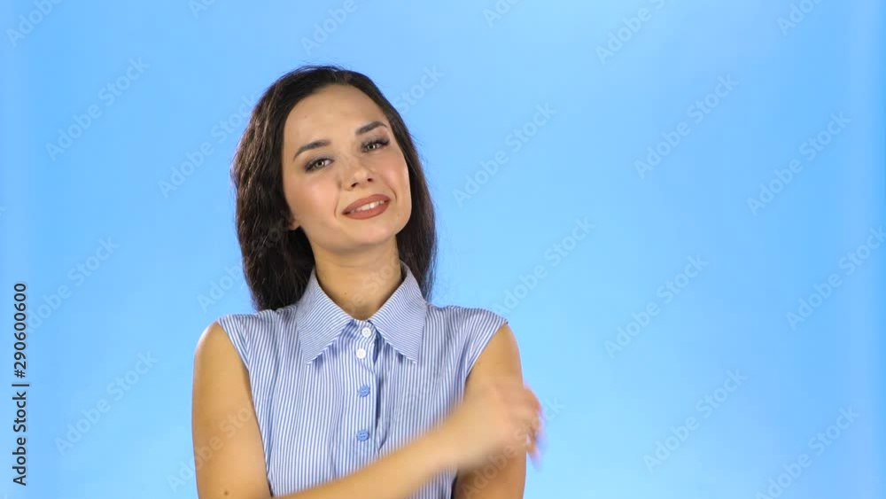 Beautiful lady thinking about something pleasant and smiling Beautiful lady thinking about something pleasant and smiling