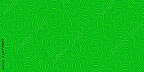Abstract background of concentric circles in green colors © Olga Moonlight
