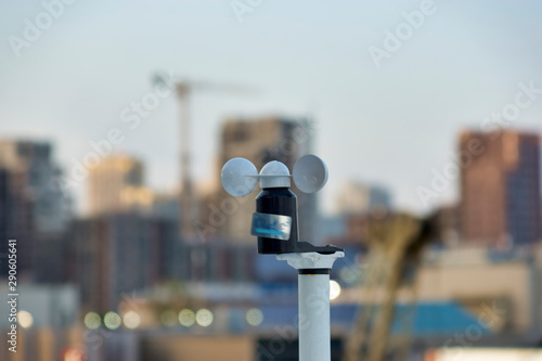Cup anemometer. Indicator for airspeed and wind direction. Blurred city background, Moscow