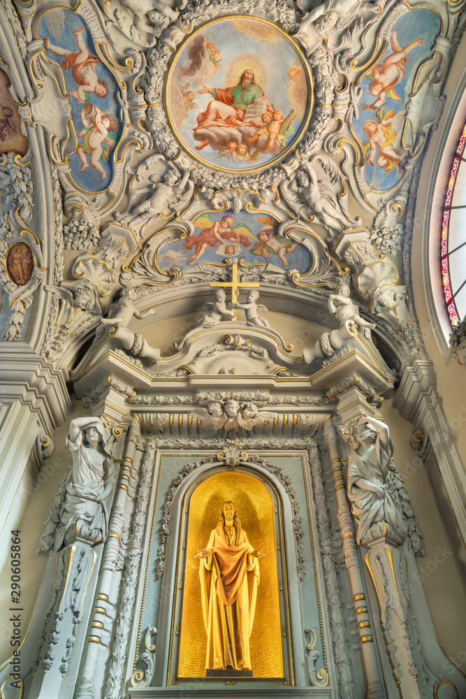 MENAGGIO, ITALY - MAY 8, 2015: The Heart of Jesus chapel and neobaroque ceiling fresco of God the Creator in church chiesa di Santo Stefano by Luigi Tagliaferri (1841-1927).