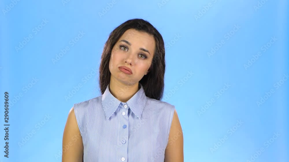 Female putting fingers to her temple like gun feeling tired Female putting fingers to her temple like gun feeling tired