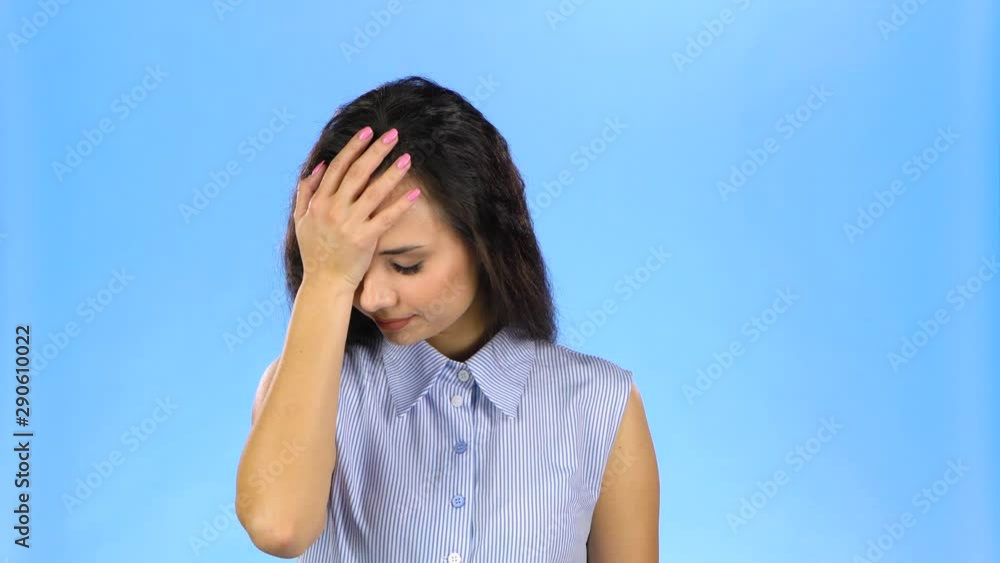 Pretty girl is upset and making facepalm Pretty girl is upset and making facepalm