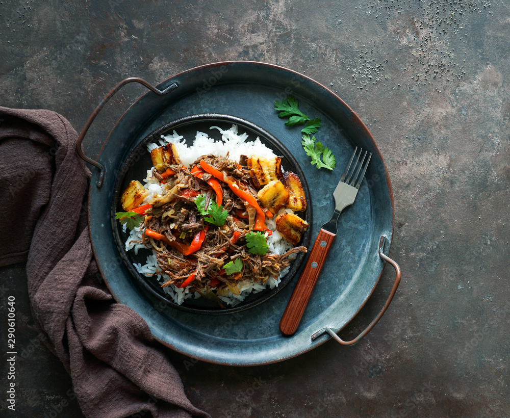 Latin america food .Ropa Vieja with Fried Plantains and rice. carne  desmechada, carne desmenuzada, carne mechada tipical food of Chile,  Colombia, Costa Rica, Cuba, Spain, Honduras, Mexico Stock Photo | Adobe  Stock