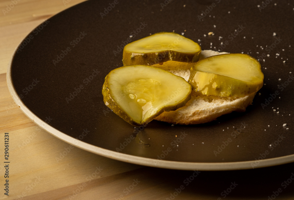 Pickles on a biscuit on a plate Pickles on a biscuit on a plate