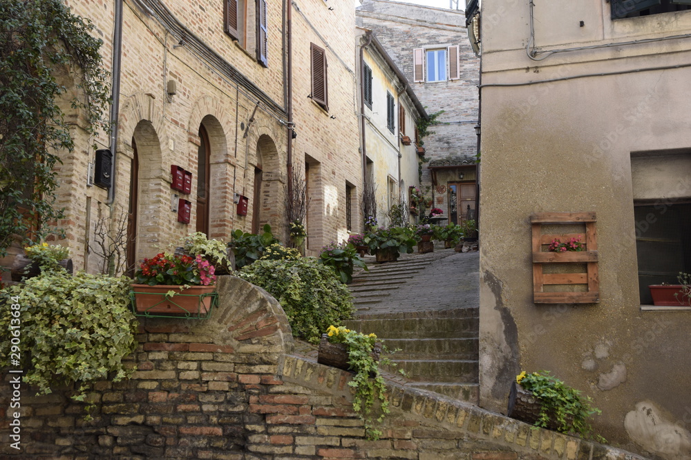 Narrow street in old town. Urbin, Italy