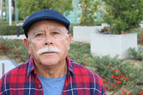  Sad senior man looking at camera 