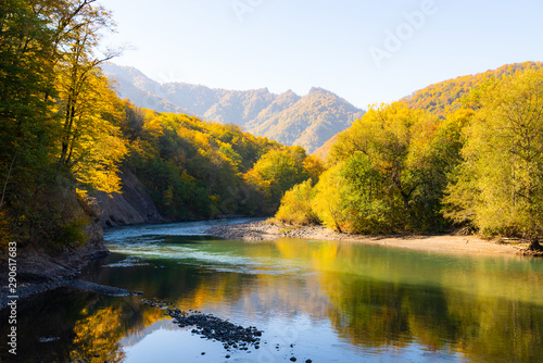 Fototapeta Naklejka Na Ścianę i Meble -  Scenic landscape with beautiful mountain river. Autumn in mountain forest.
