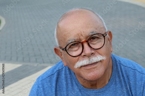 Bild auf Leinwand Bald senior man with a mustache