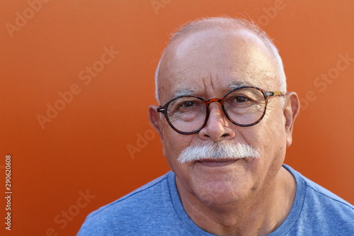  Bald senior man looking at camera