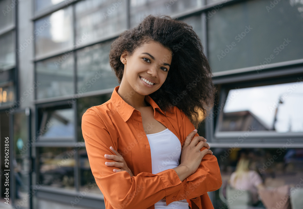 Authentic portrait of young creative small business owner standing