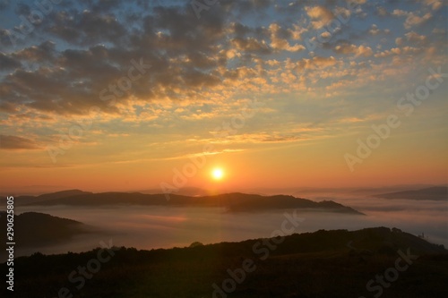 Wallpaper Mural sunrise over mountains with fog in the valley Torontodigital.ca