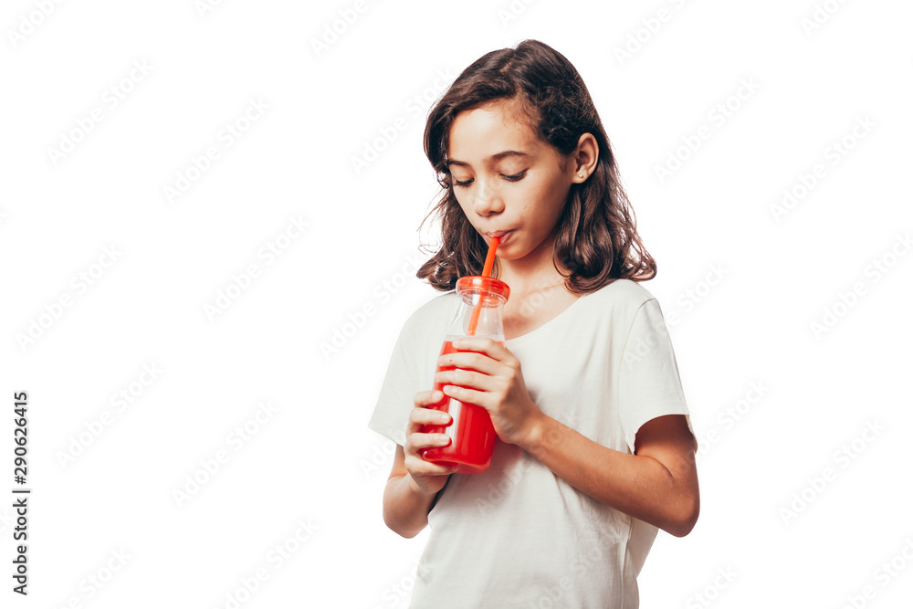 Portrait of girl with a bottle of juice isolated on white background Portrait of girl with a bottle of juice isolated on white background