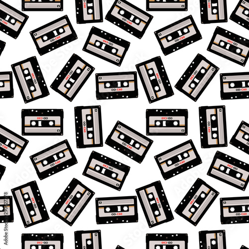 Seamless pattern in retro style with audio cassettes