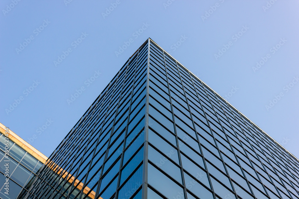 perfect geometry of blue facade of scyscraper mirrors the sky triangle pyramid perfect geometry of blue facade of scyscraper mirrors the sky triangle pyramid