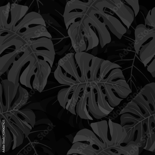 Seamless pattern with tropical leaves in gray colors