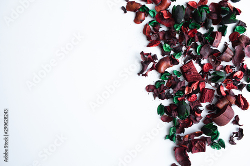 Flowers composition. Frame made of dried rose flowers on white background. Flat lay, top view, copy space photo