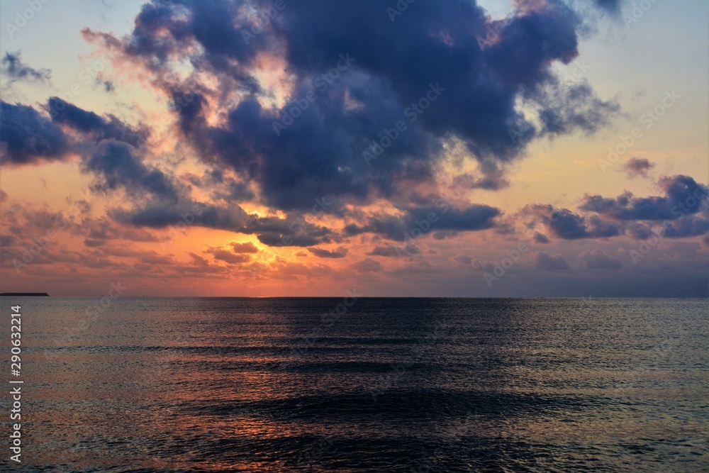 sunrise with clouds on the seashore sunrise with clouds on the seashore