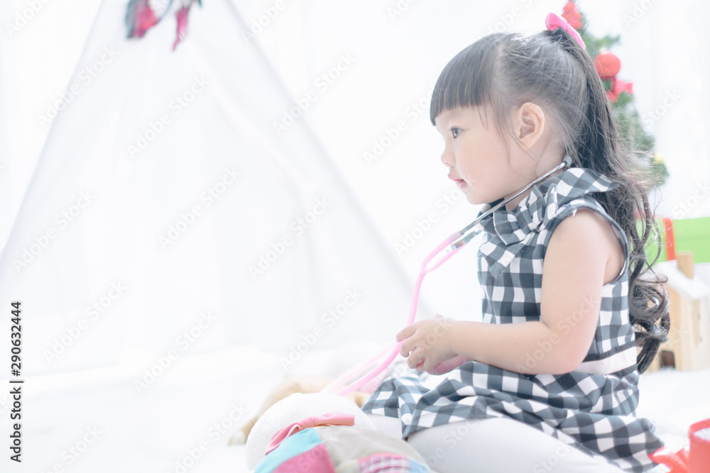 Merry christmas happy little child with beautifully decorated christmas tree holidays in home, christmas concept Merry christmas happy little child with beautifully decorated christmas tree holidays in home, christmas concept