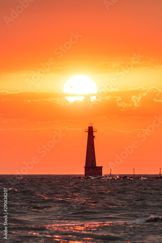 lighthouse at sunset © Walter E Elliott