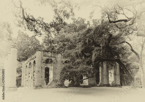 Sepia image of historical Sheldon Church brick structure ruins with columns and overhanging trees and shade photo
