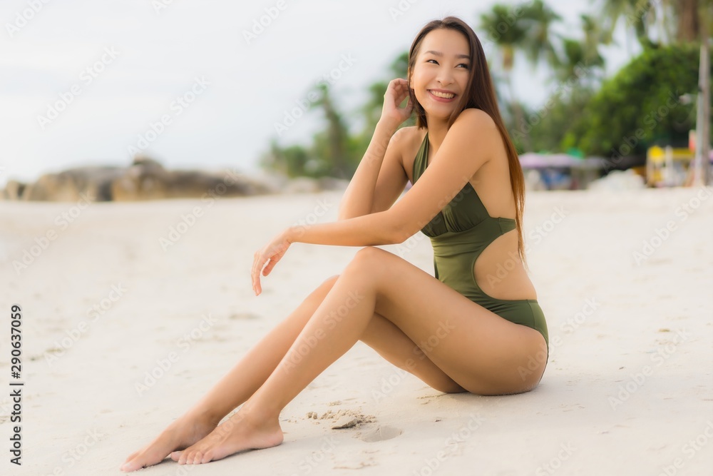 Portrait beautiful asian women happy smile relax on the tropical beach sea ocean Portrait beautiful asian women happy smile relax on the tropical beach sea ocean