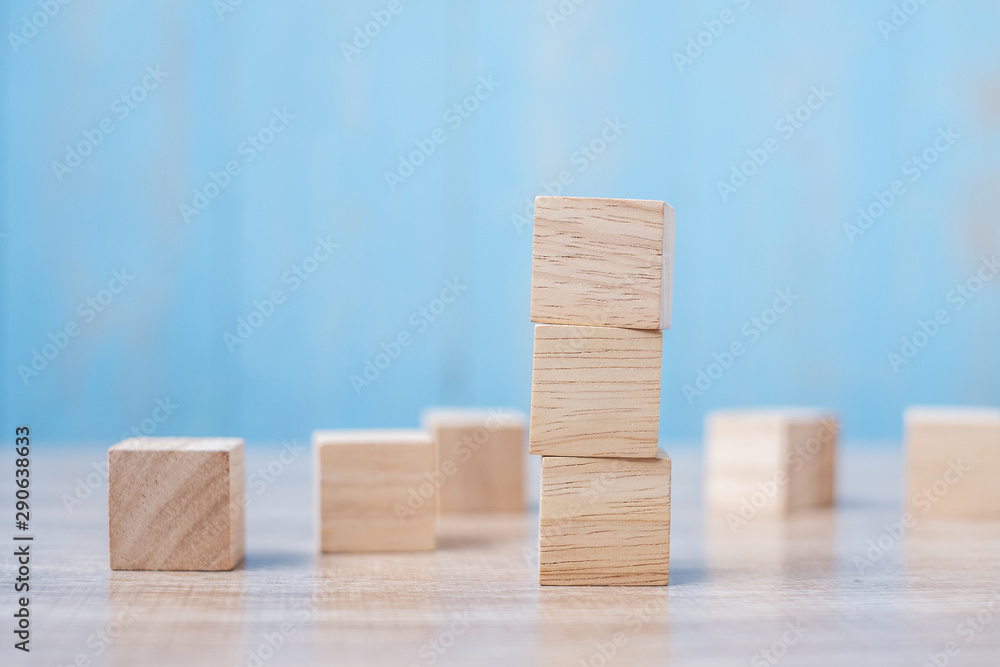 wooden block on the building. Business planning, Risk Management, Solution, strategy, different and Unique Concepts wooden block on the building. Business planning, Risk Management, Solution, strategy, different and Unique Concepts