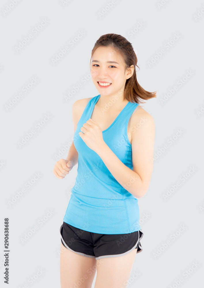 Beautiful young asian woman happy and smiling jogging isolated on white background, asia girl cheerful in sport is activity exercise cardio and workout with running for healthy, health concept.