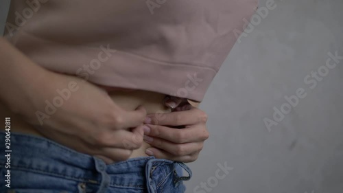 young girl curl up with stomach ache because menstrual pain, young woman have problem about health.