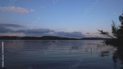 Stunning time lapse of a sunset over Lake Baptist in Ontario Canada photo