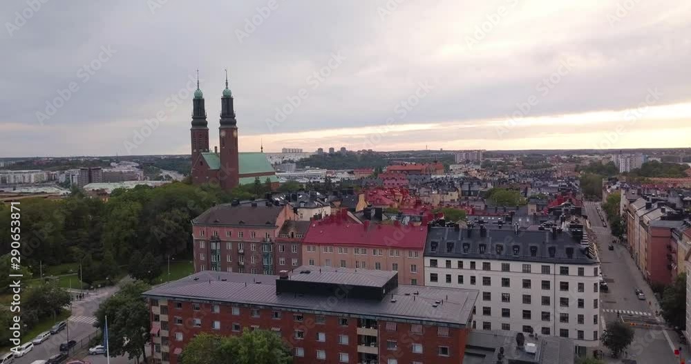 Aerial view cloudy day, Stockholm Sweden. Drone flies low over buildings.