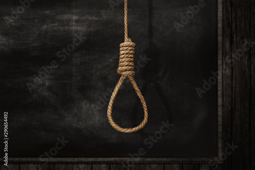 Rope noose on background, a loop of rope for hanging on a Blackboard photo